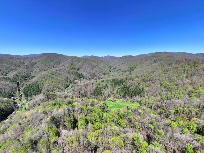 2180 Pigeon Roost Road, Green Mountain, NC 28740.  MLS# CAR4137054, YatesRealty ID 1587. One ridge has a nice flat top -- would you put a gazebo or firepit up here?