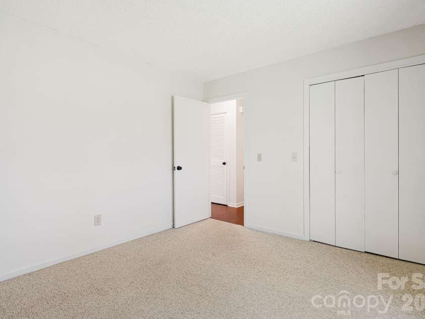 28 Capri Lane, Hendersonville, NC 28792.  MLS# CAR4247195, YatesRealty ID 15870. 