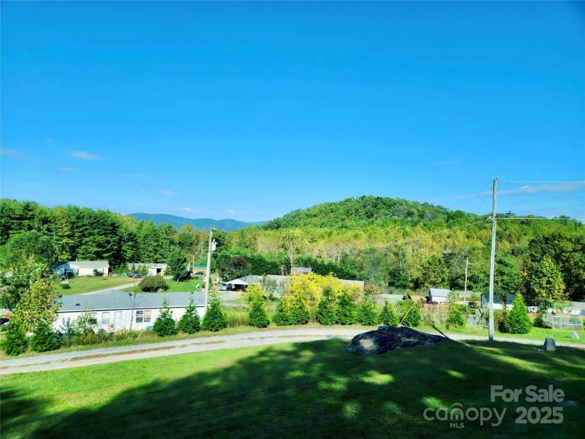 36 Whisper Mountain Road, Hendersonville, NC 28792.  MLS# CAR4186753, YatesRealty ID 15871. 