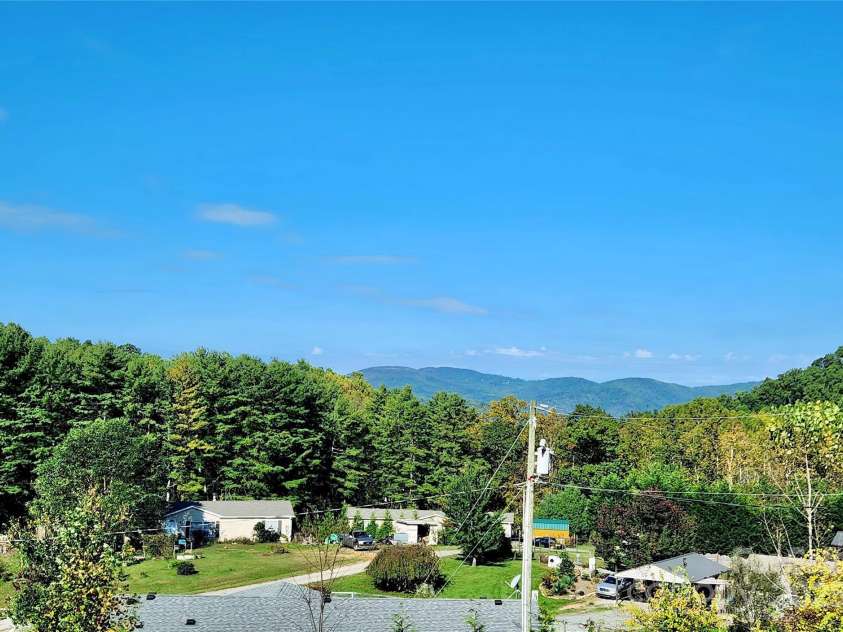 36 Whisper Mountain Road, Hendersonville, NC 28792.  MLS# CAR4186753, YatesRealty ID 15871. 