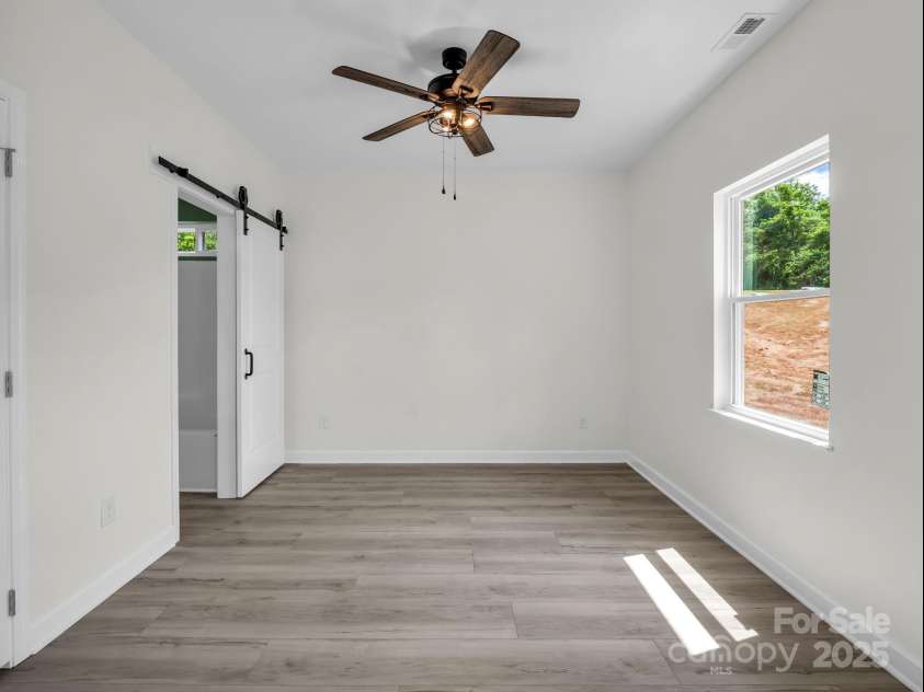 174 Charlie Randall Road, Lawndale, NC 28090.  MLS# CAR4276415, YatesRealty ID 15876. Convenient dual-entry bathroom offers private access from both the hallway and bedroom.