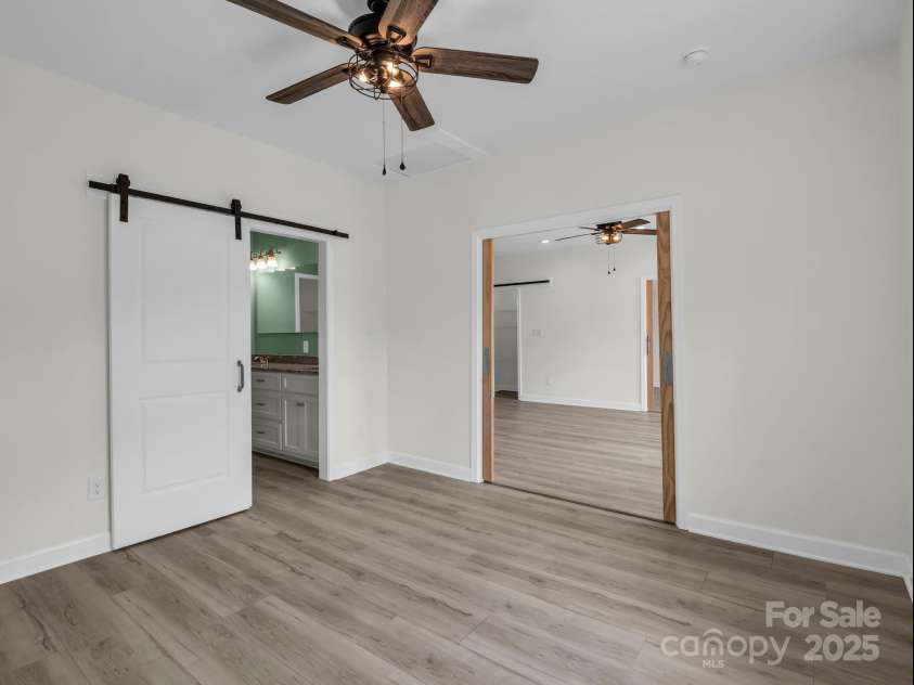 174 Charlie Randall Road, Lawndale, NC 28090.  MLS# CAR4276415, YatesRealty ID 15876. Indulge in the elegance and privacy of your primary bathroom