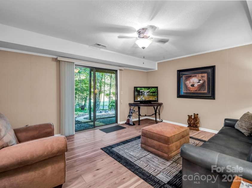 193 Downing Place, Lake Lure, NC 28746.  MLS# CAR4280208, YatesRealty ID 1588. Additional space for guests in the finished walk-out basement.