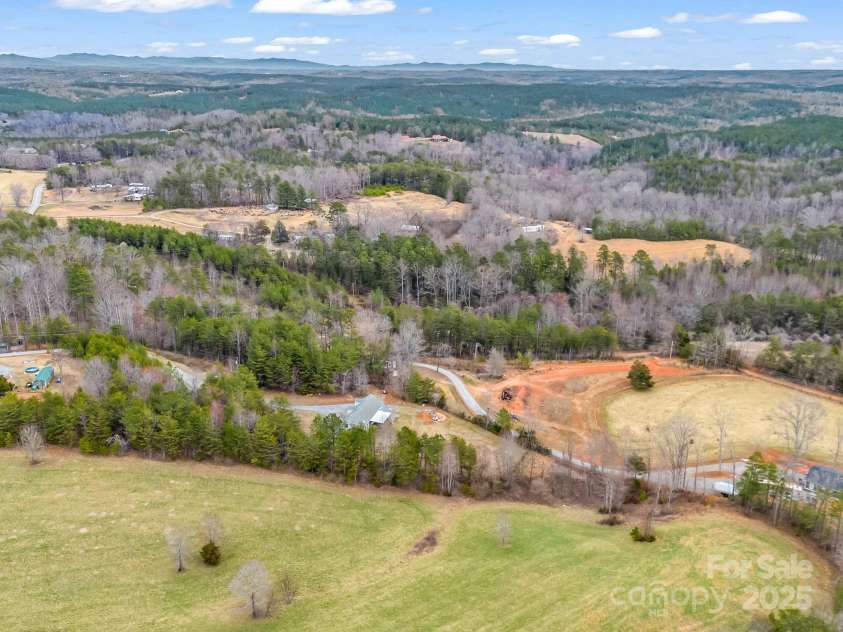135 Dakota Hill Lane, Mill Spring, NC 28756.  MLS# CAR4229222, YatesRealty ID 15880. Aerial