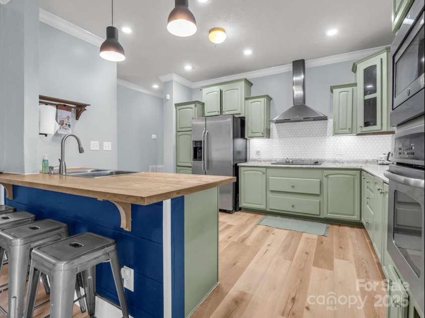 135 Dakota Hill Lane, Mill Spring, NC 28756.  MLS# CAR4229222, YatesRealty ID 15880. Kitchen