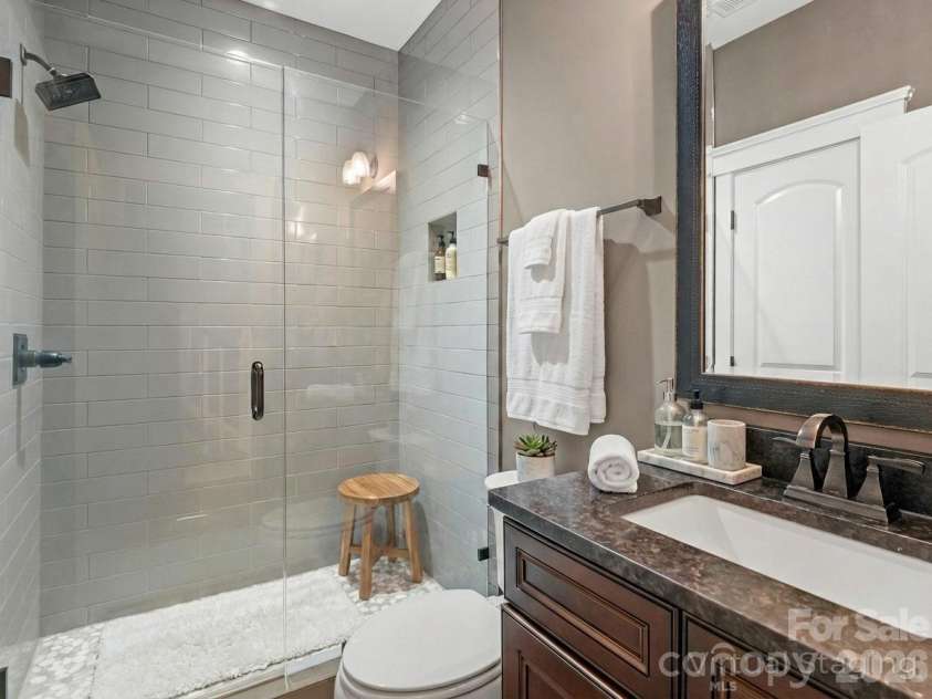 308 Rosemont Row, Belmont, NC 28012.  MLS# CAR4343510, YatesRealty ID 15883. Virtually Staged ~ Main Level Full Bath with Tile Floors and Tiled Surround Shower.