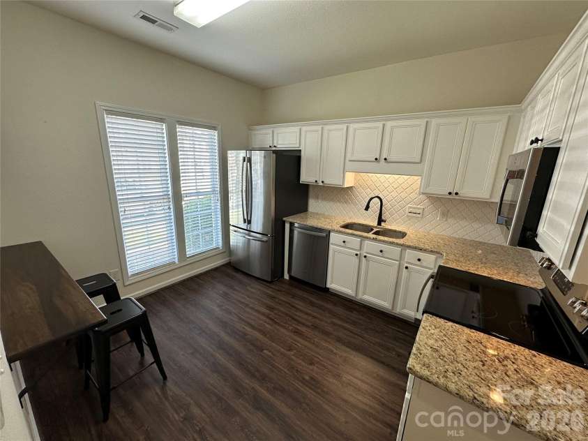 4047 Center Place Drive, Harrisburg, NC 28075.  MLS# CAR4367583, YatesRealty ID 15889. 