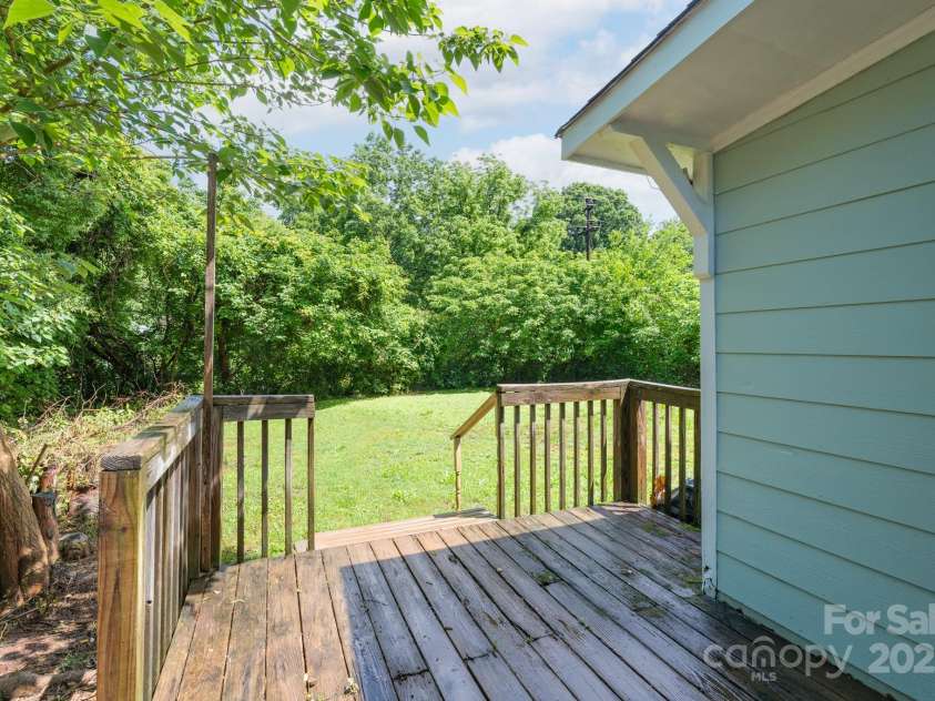 917 Laye Street, Belmont, NC 28012.  MLS# CAR4254861, YatesRealty ID 15892. Deck off of the laundry room