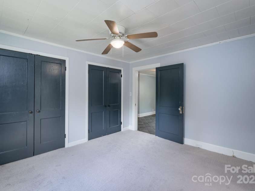 917 Laye Street, Belmont, NC 28012.  MLS# CAR4254861, YatesRealty ID 15892. Primary bedroom with new carpet and double closets