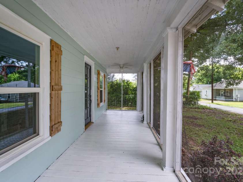 917 Laye Street, Belmont, NC 28012.  MLS# CAR4254861, YatesRealty ID 15892. Rocking chair front porch - plenty of room for rockers and a swing