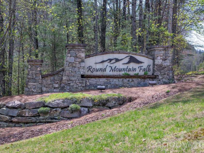 716 Peppervine Circle, Brevard, NC 28712.  MLS# CAR4374507, YatesRealty ID 15899. Main Entrance Sign