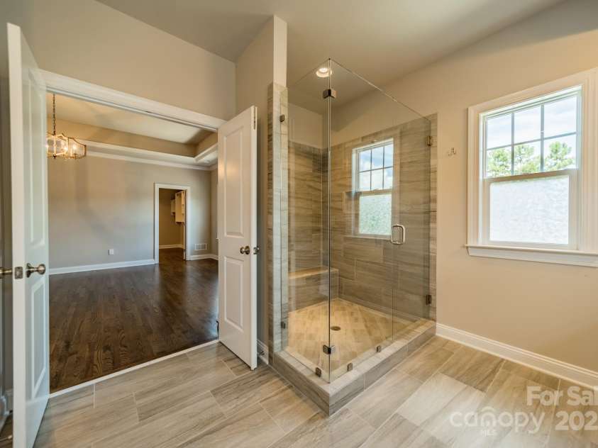 142 Tuscany Trail, Mooresville, NC 28117.  MLS# CAR4230822, YatesRealty ID 1590. Personal Spa Visit Daily