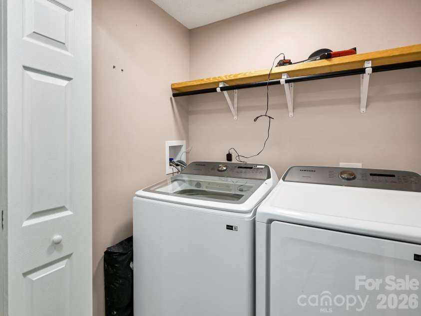 2275 Lamb Mountain Road, Hendersonville, NC 28792.  MLS# CAR4374326, YatesRealty ID 15901. Laundry Room off kitchen