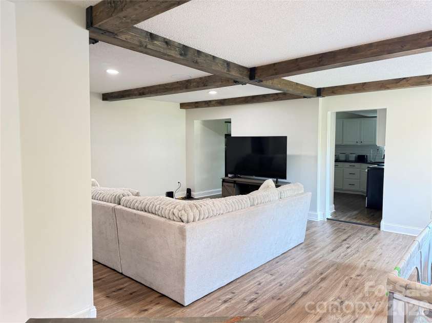 1442 Lee Pearson Road, Lenoir, NC 28645.  MLS# CAR4374752, YatesRealty ID 15903. Living Room/View Into Kitchen