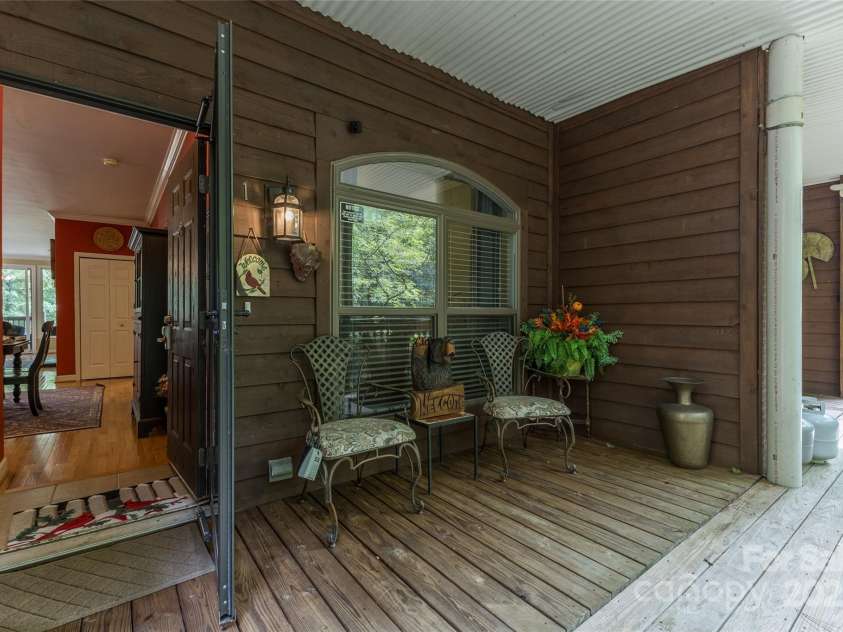 30 Lower Tanglewood Road, Lake Toxaway, NC 28747.  MLS# CAR4176732, YatesRealty ID 15904. Covered front entrance