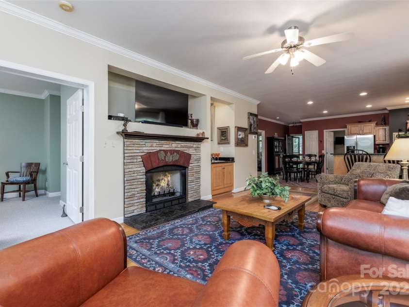 30 Lower Tanglewood Road, Lake Toxaway, NC 28747.  MLS# CAR4176732, YatesRealty ID 15904. Gas log fireplace
