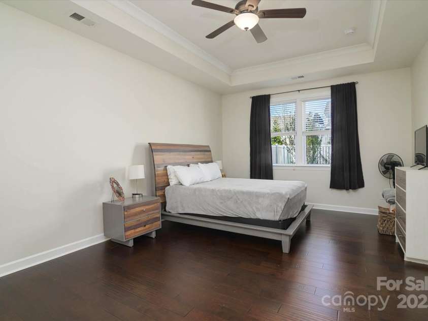 1495 Imperial Court, York, SC 29745.  MLS# CAR4241935, YatesRealty ID 15908. Spacious Primary Bedroom with tray ceiling