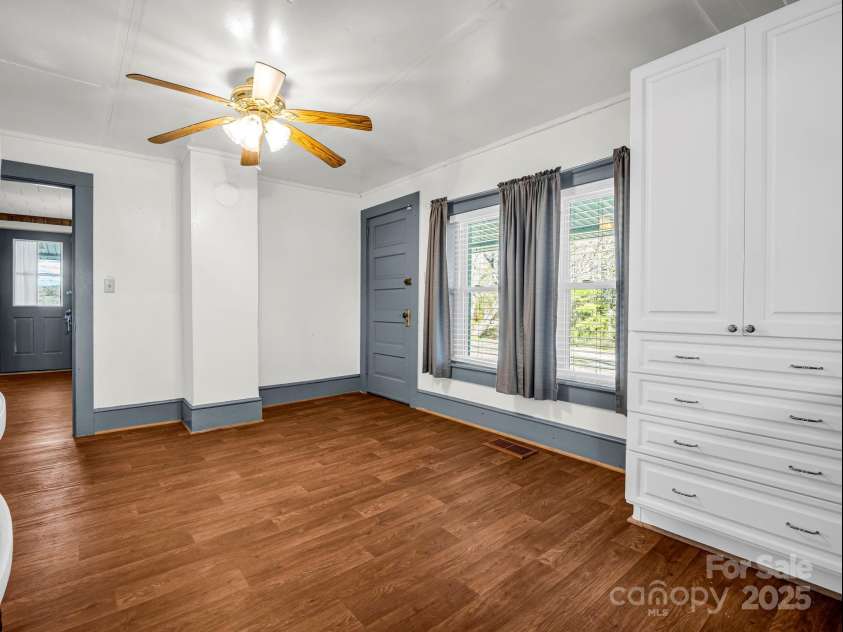 620 Smith Waldrop Road, Columbus, NC 28722.  MLS# CAR4209729, YatesRealty ID 15909. Dining area, opens to kitchen & access to wrap around porch.