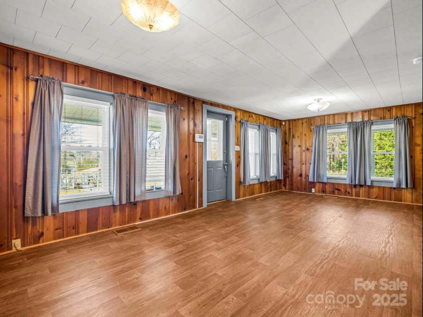 620 Smith Waldrop Road, Columbus, NC 28722.  MLS# CAR4209729, YatesRealty ID 15909. Living room in main house