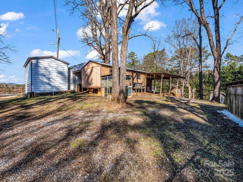 620 Smith Waldrop Road, Columbus, NC 28722.  MLS# CAR4209729, YatesRealty ID 15909. Storage and area for animals.
