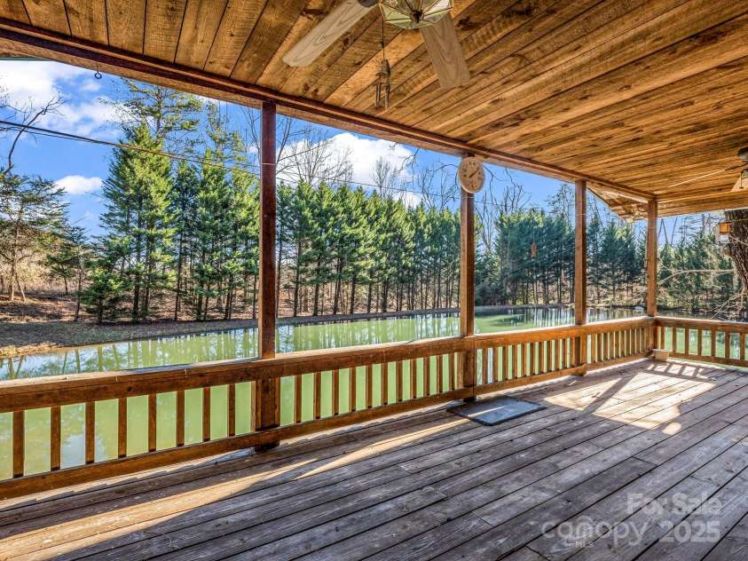 620 Smith Waldrop Road, Columbus, NC 28722.  MLS# CAR4209729, YatesRealty ID 15909. View of pond from cabin