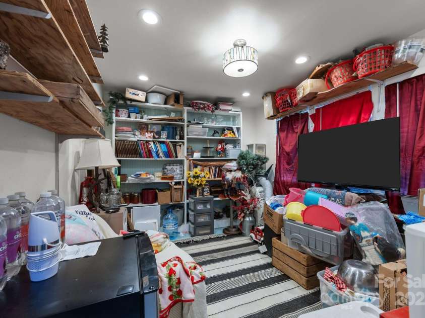 3004 Cane Creek Road, Bakersville, NC 28705.  MLS# CAR4240677, YatesRealty ID 15910. Bedroom off of kitchen