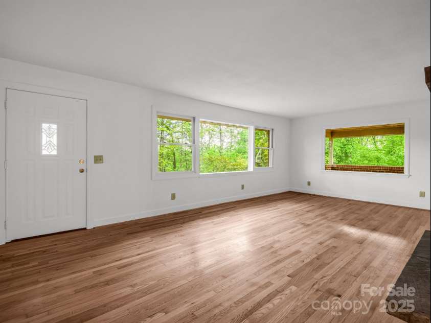 200 Little Wings Mountain Road, Columbus, NC 28722.  MLS# CAR4247898, YatesRealty ID 15911. Beautifully re-finished floors in Living Room