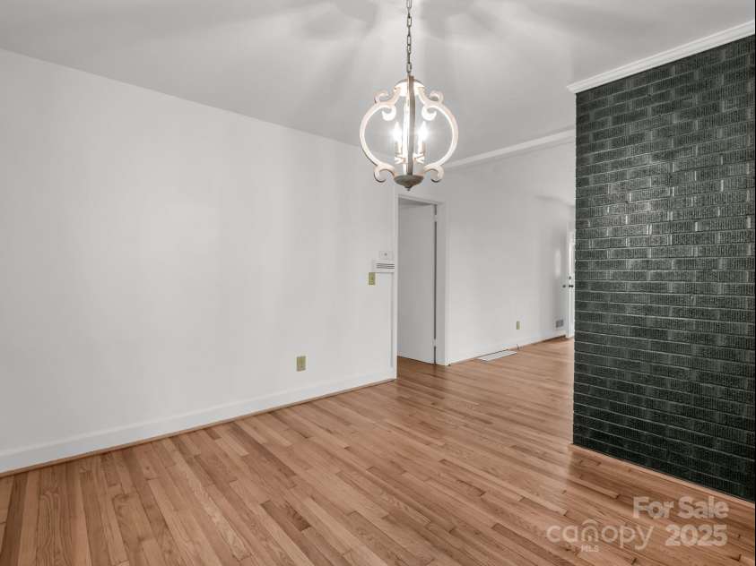 200 Little Wings Mountain Road, Columbus, NC 28722.  MLS# CAR4247898, YatesRealty ID 15911. Dining Room looking towards Living Room