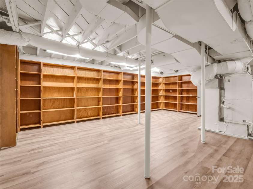 200 Little Wings Mountain Road, Columbus, NC 28722.  MLS# CAR4289310, YatesRealty ID 15911. Basement has lots of built-ins