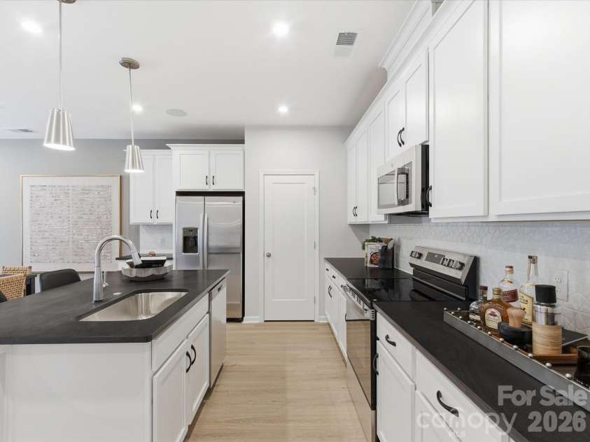 8418 Discovery Lane, Charlotte, NC 28216.  MLS# CAR4375011, YatesRealty ID 15916. Avett Plan Model Photo