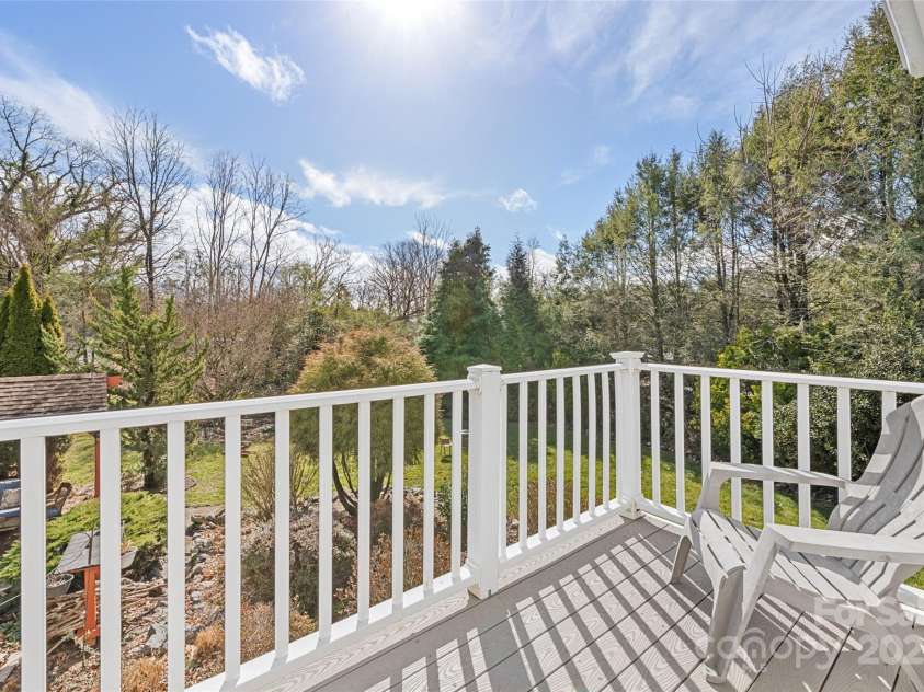 149 Southbrook Lane, Fletcher, NC 28732.  MLS# CAR4221393, YatesRealty ID 15918. A porch off the enclosed porch is a sanctuary overlooking the gazebo.