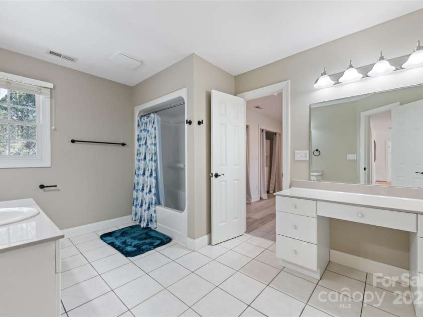 149 Southbrook Lane, Fletcher, NC 28732.  MLS# CAR4221393, YatesRealty ID 15918. Full secondary bathroom upstairs