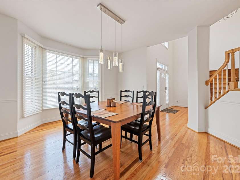 149 Southbrook Lane, Fletcher, NC 28732.  MLS# CAR4221393, YatesRealty ID 15918. Gathering around the table for celebrations or special meals has never been easier.  This room easily accomodates a larger table for family and friends.