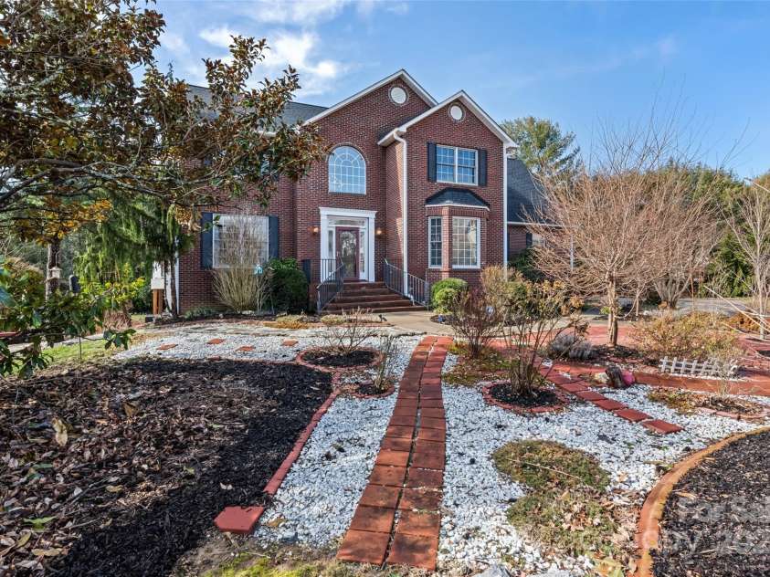 149 Southbrook Lane, Fletcher, NC 28732.  MLS# CAR4221393, YatesRealty ID 15918. No matter the season this home boasts lovely plantings of trees, shrubs and perennials sure to captivate with visual appeal.