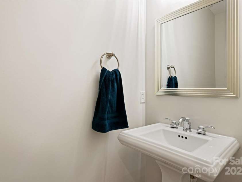 149 Southbrook Lane, Fletcher, NC 28732.  MLS# CAR4221393, YatesRealty ID 15918. Powder room across from the laundry room.