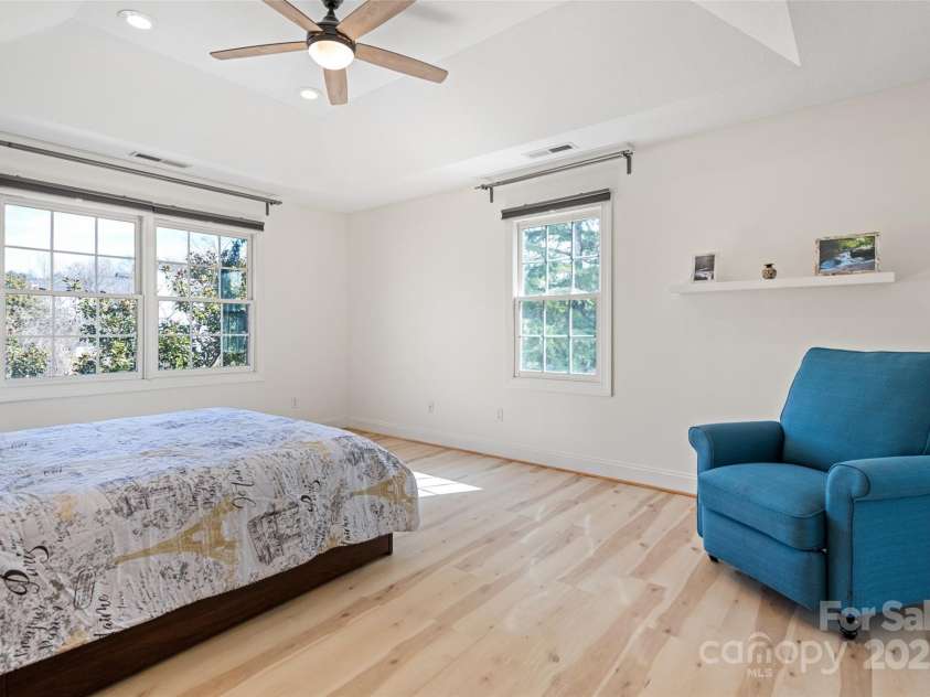 149 Southbrook Lane, Fletcher, NC 28732.  MLS# CAR4221393, YatesRealty ID 15918. Primary bedroom has dual aspect windows.