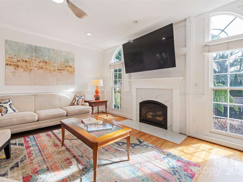 149 Southbrook Lane, Fletcher, NC 28732.  MLS# CAR4221393, YatesRealty ID 15918. The hearth is the heart of this home and perfect for cozying up on a chilly night while enjoying your favorite show.