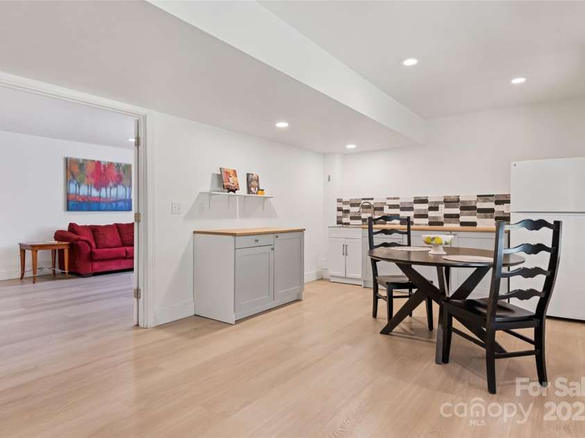 149 Southbrook Lane, Fletcher, NC 28732.  MLS# CAR4221393, YatesRealty ID 15918. This tasteful kitchenette makes food prep for the game or movie night easy.