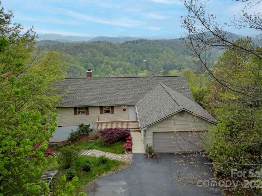 70 Moor Lane, Brevard, NC 28712.  MLS# CAR4134812, YatesRealty ID 1592. Unbelievable setting 9 miles from downtown