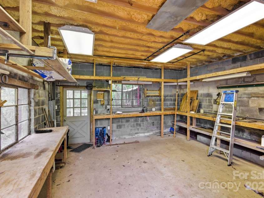 132 Little Knob Road, Asheville, NC 28803.  MLS# CAR4314463, YatesRealty ID 1593. Garage Workshop