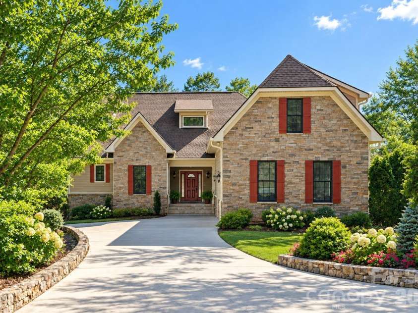 16 WINTERBERRY Drive, Hendersonville, NC 28739.  MLS# CAR4343974, YatesRealty ID 1593. Summer created by Chat GPT