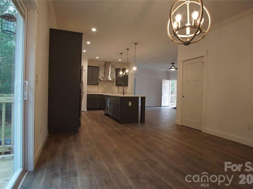 274 Quail Hill Drive, Rutherfordton, NC 28139.  MLS# CAR4322920, YatesRealty ID 15939. Dining room looking back to kitchen