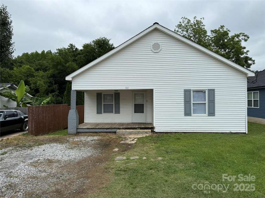 303 Southern Avenue, East Spencer, NC 28039.  MLS# CAR4264800, YatesRealty ID 15941. 