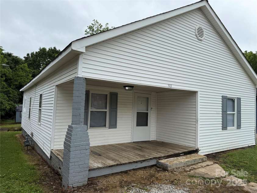 303 Southern Avenue, East Spencer, NC 28039.  MLS# CAR4264800, YatesRealty ID 15941. 