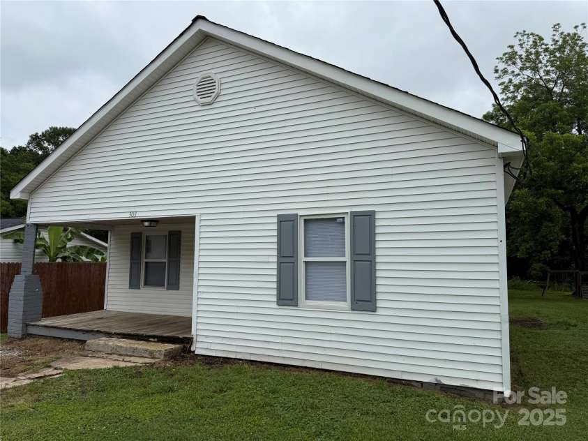 303 Southern Avenue, East Spencer, NC 28039.  MLS# CAR4264800, YatesRealty ID 15941. 