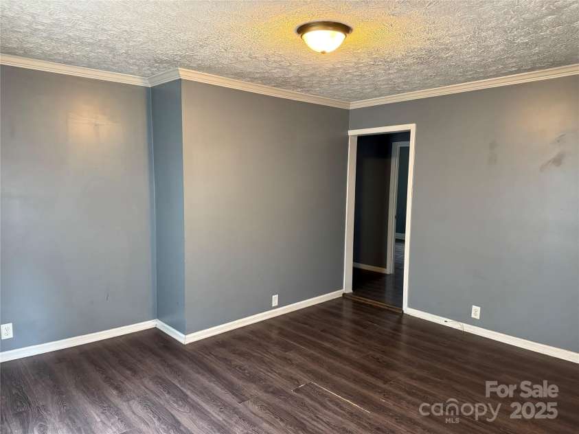 303 Southern Avenue, East Spencer, NC 28039.  MLS# CAR4264800, YatesRealty ID 15941. 