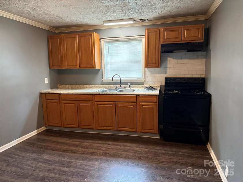 303 Southern Avenue, East Spencer, NC 28039.  MLS# CAR4264800, YatesRealty ID 15941. 