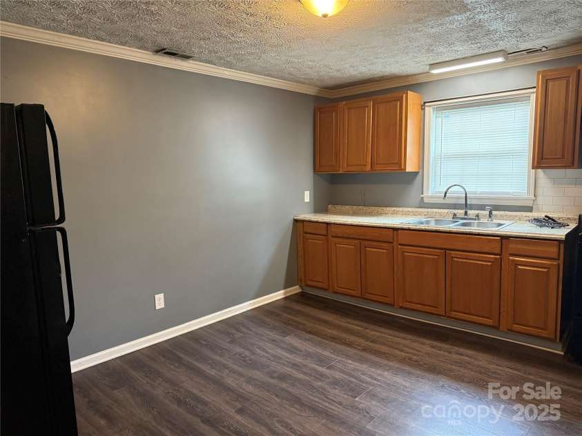 303 Southern Avenue, East Spencer, NC 28039.  MLS# CAR4264800, YatesRealty ID 15941. 