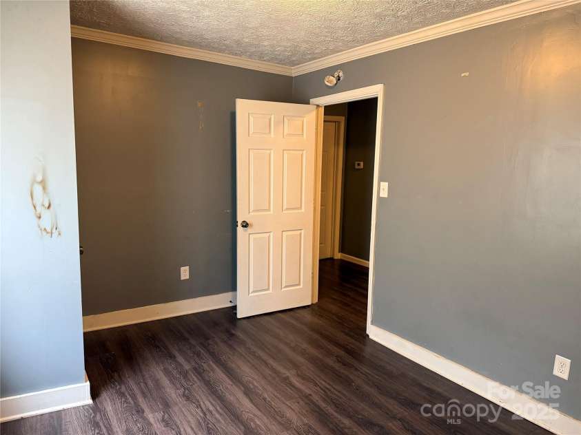 303 Southern Avenue, East Spencer, NC 28039.  MLS# CAR4264800, YatesRealty ID 15941. 