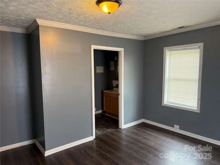 303 Southern Avenue, East Spencer, NC 28039.  MLS# CAR4264800, YatesRealty ID 15941. 